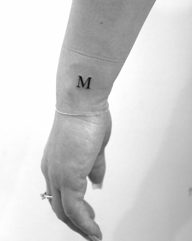 letter-m-with-a-hand-by-tattooist-fury-art-cool-arm-tattoos-hand